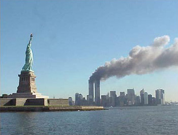 9-11_Statue_of_Liberty_and_WTC